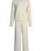 A luxurious cashmere set in craie color, combining softness and warmth with a relaxed fit and chic silhouette.