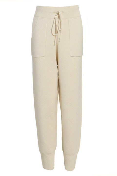 Soft cashmere blend knit pants with an elasticated waistband and relaxed leg, offering comfort and warmth for fall and winter days.